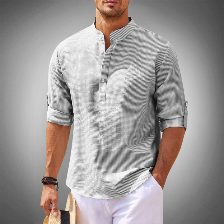 Modern men's button-down shirt, light fabric, long sleeve. Perfect for spring & summer fashion.
