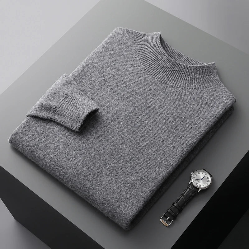 Stylish men's long-sleeve mock neck sweater, textured, offering elevated comfort for winter wear.