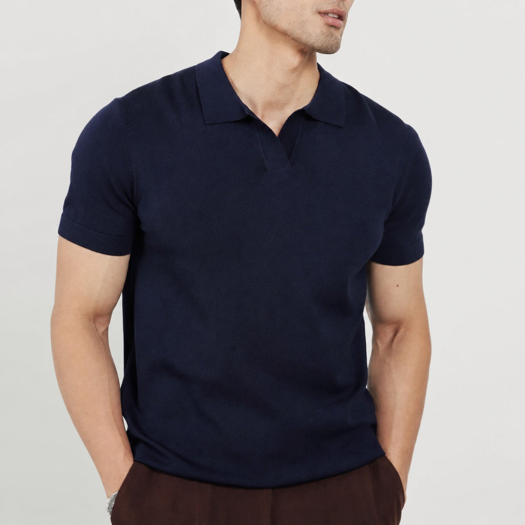 Modern men's short sleeve polo featuring an open collar; ideal for professional or relaxed settings.