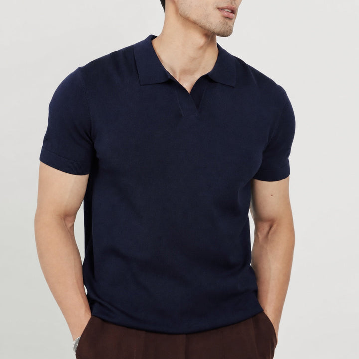 Modern men's short sleeve polo featuring an open collar; ideal for professional or relaxed settings.