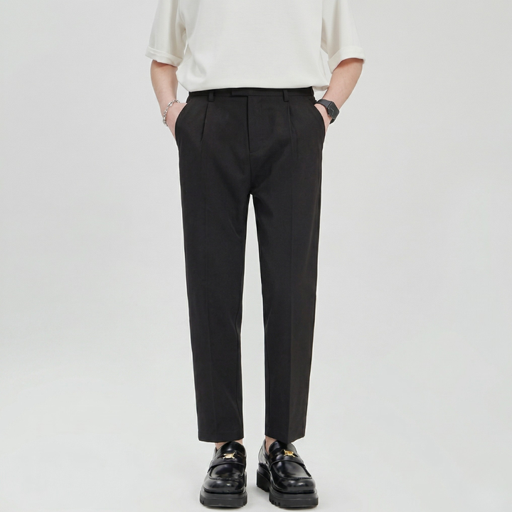 Relaxed fit men's wide leg chinos with pleats and a comfortable adjustable drawstring waist.