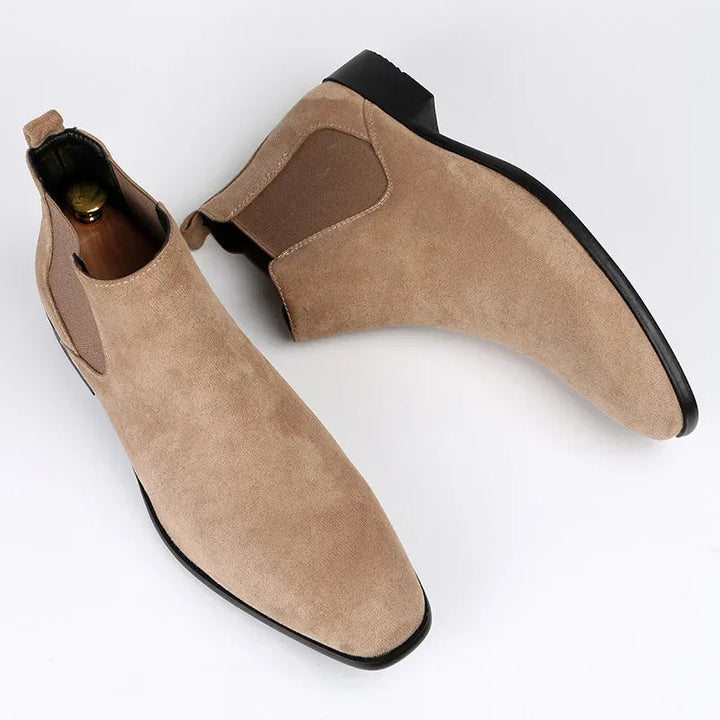 Stylish beige men's ankle Chelsea boots, offering a comfortable pull-on fit and fashionable appeal.