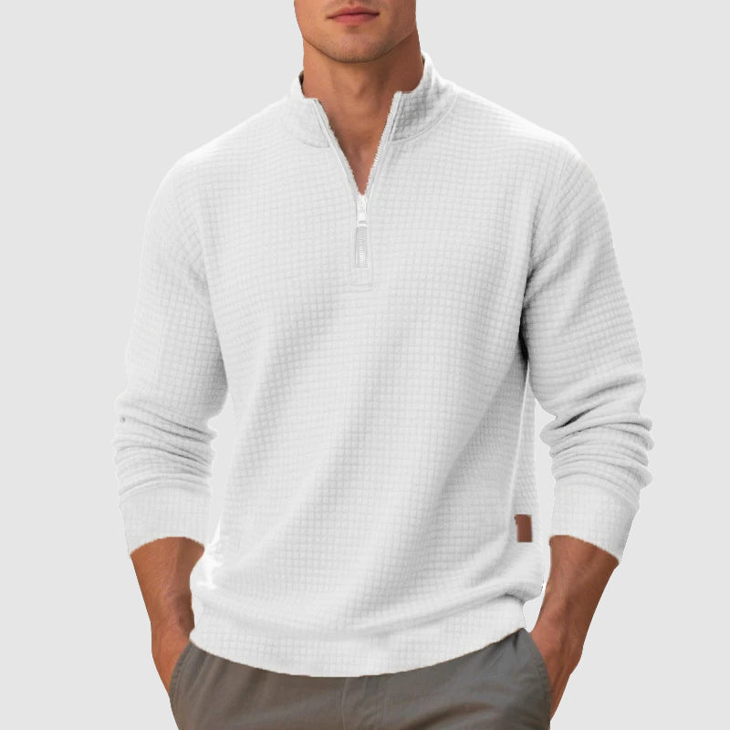 Versatile men's quarter-zip jumper. Stylish pullover sweater for casual wear, layering, and refined comfort.