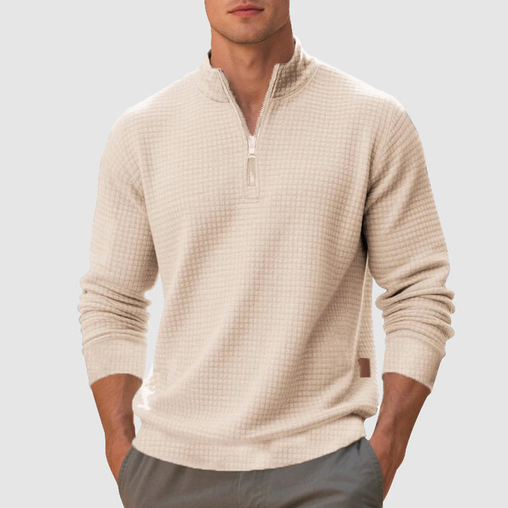 Men's stand collar quarter-zip pullover. Textured design sweater offering refined casual comfort & style.