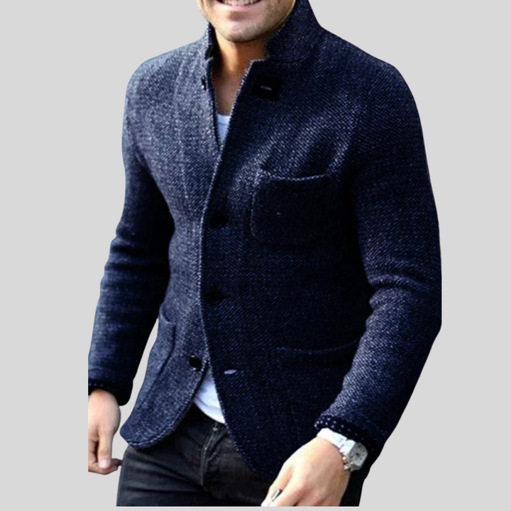Warm men's quilted blazer jacket, ideal for cold weather business wear. Modern outerwear with stylish lapel.