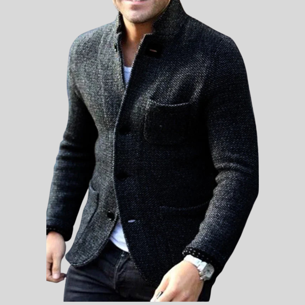 New men's quilted blazer jacket, featuring a modern design and button-front. Stylish outerwear for cold weather.