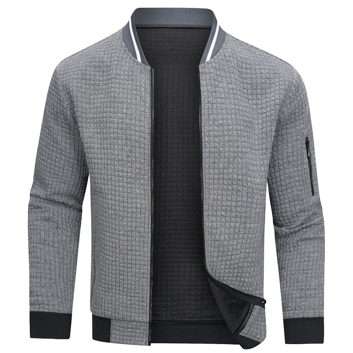 Men's fashion fall/spring jacket, a versatile quilted bomber with a sleek zip-up design.