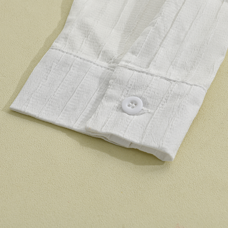 Detailed view of the collar and buttons on a men's ribbed long sleeve shirt