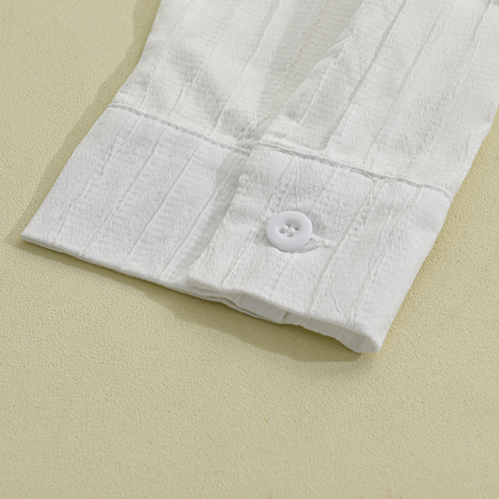 Detailed view of the collar and buttons on a men's ribbed long sleeve shirt