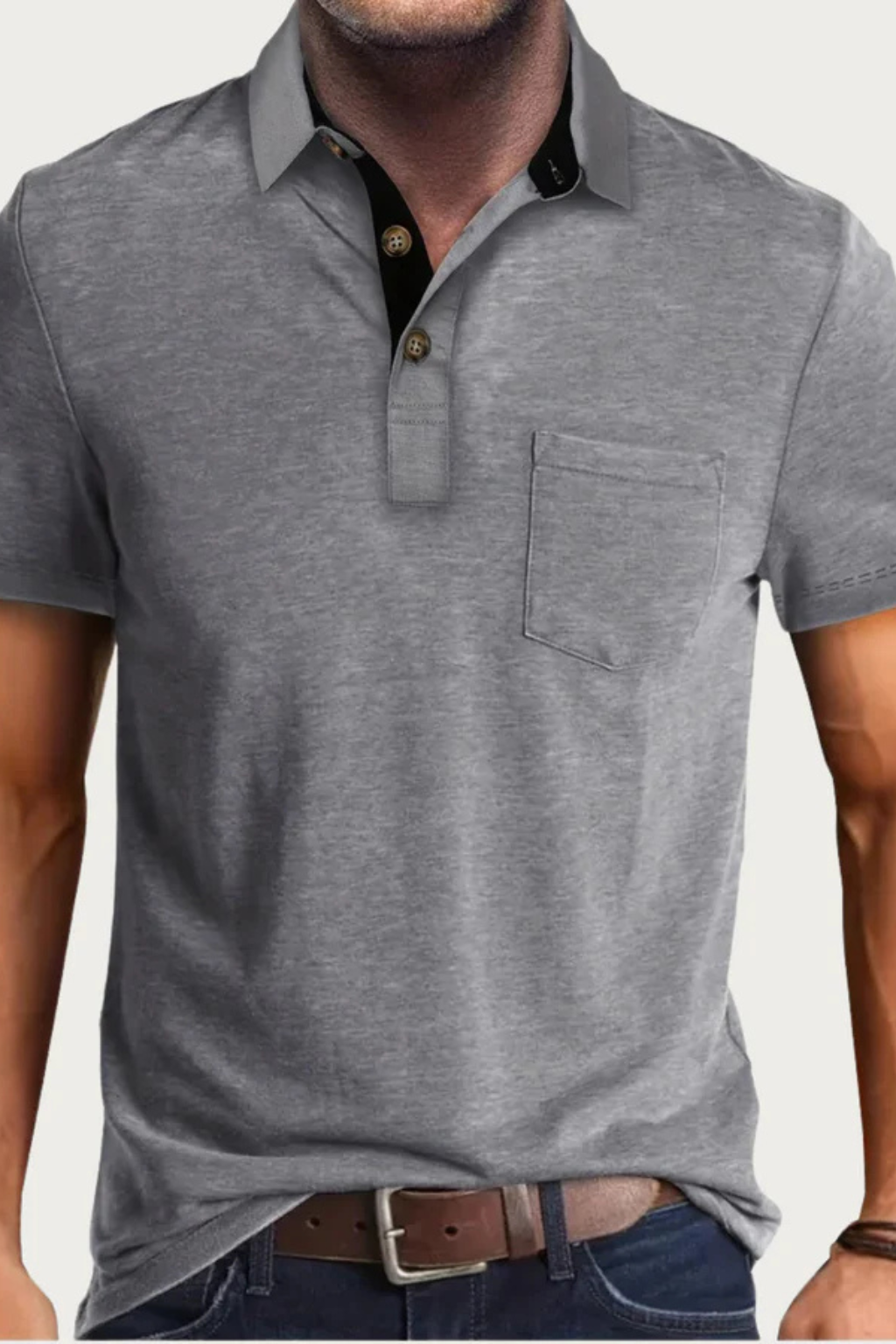 Everyday men's fashion: short sleeve polo with a sophisticated contrast collar and functional pocket.