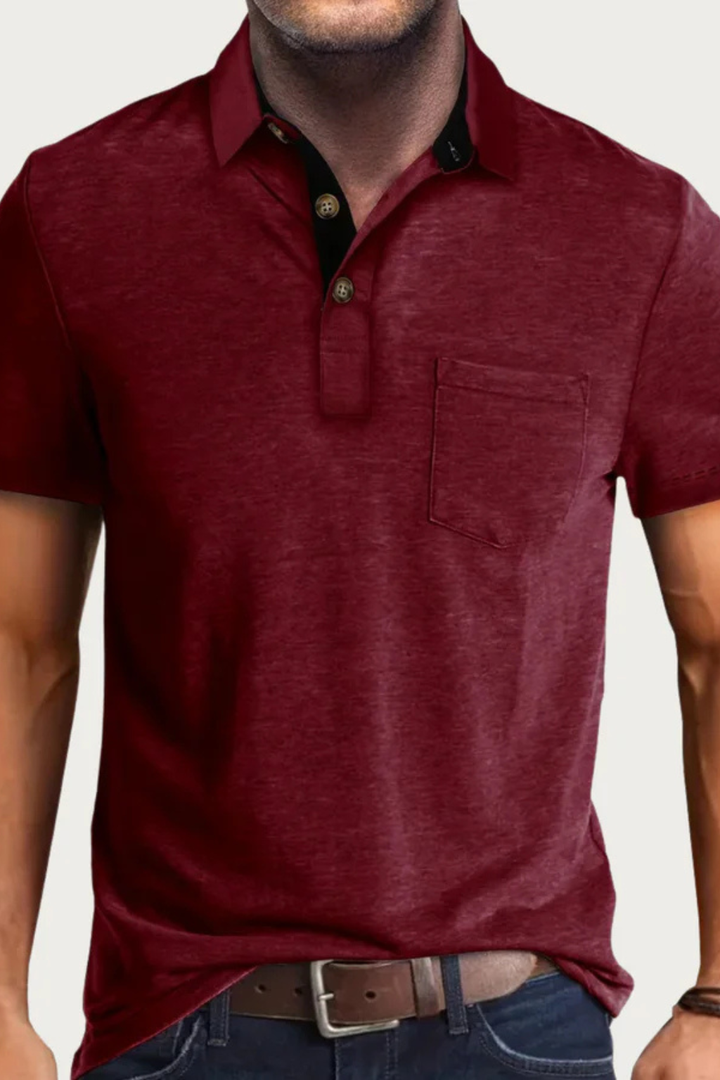 Classic men's short sleeve polo shirt with a trendy contrast collar and convenient chest pocket. Summer fashion.