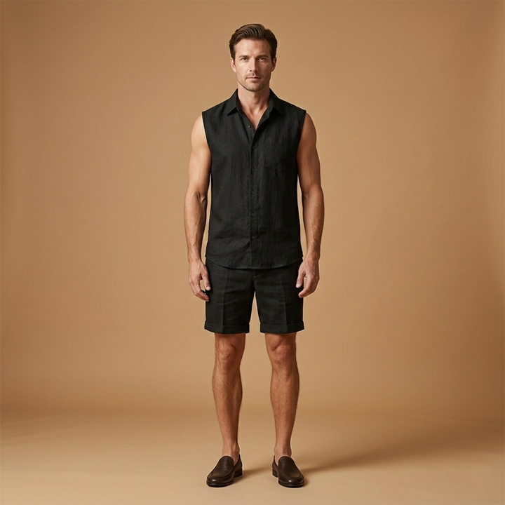 Relaxed fit men's two-piece sleeveless button shirt and shorts outfit, ideal for summer casual wear.