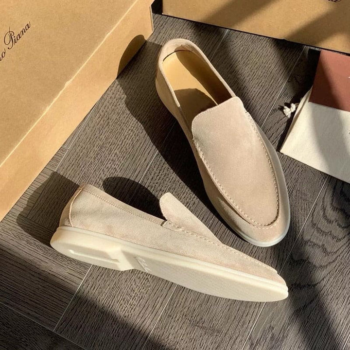 Comfortable men's leather slip-on loafers. Stylish design for casual outings or smart formal events. Easy wear.
