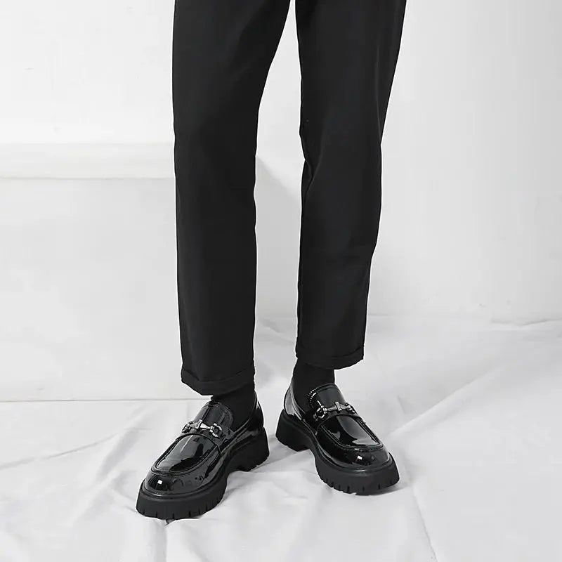 Refined men's dress shoes: slip-on loafers with an elegant metal buckle for formal events.