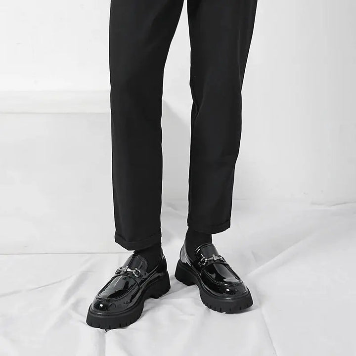 Refined men's dress shoes: slip-on loafers with an elegant metal buckle for formal events.