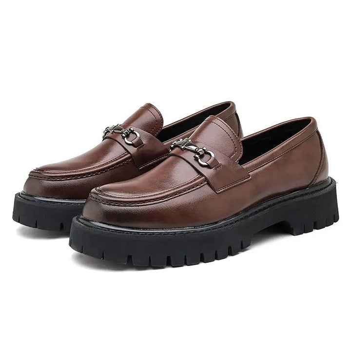 Comfortable & stylish men's slip-on loafers, metal buckle detail for business or smart casual outfits.
