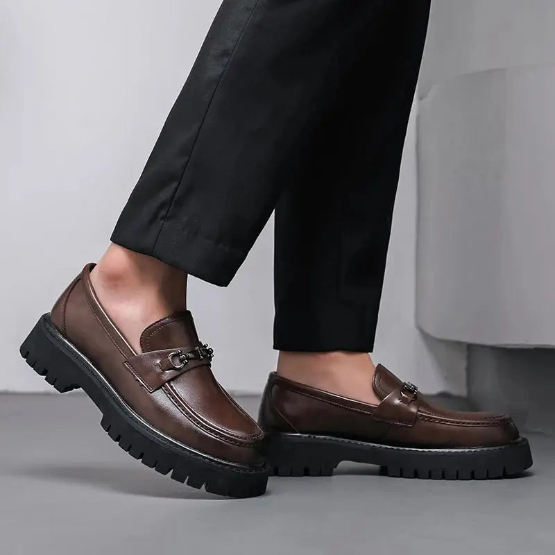 Formal men's dress loafers with sleek metal buckle, ideal for business meetings and events.
