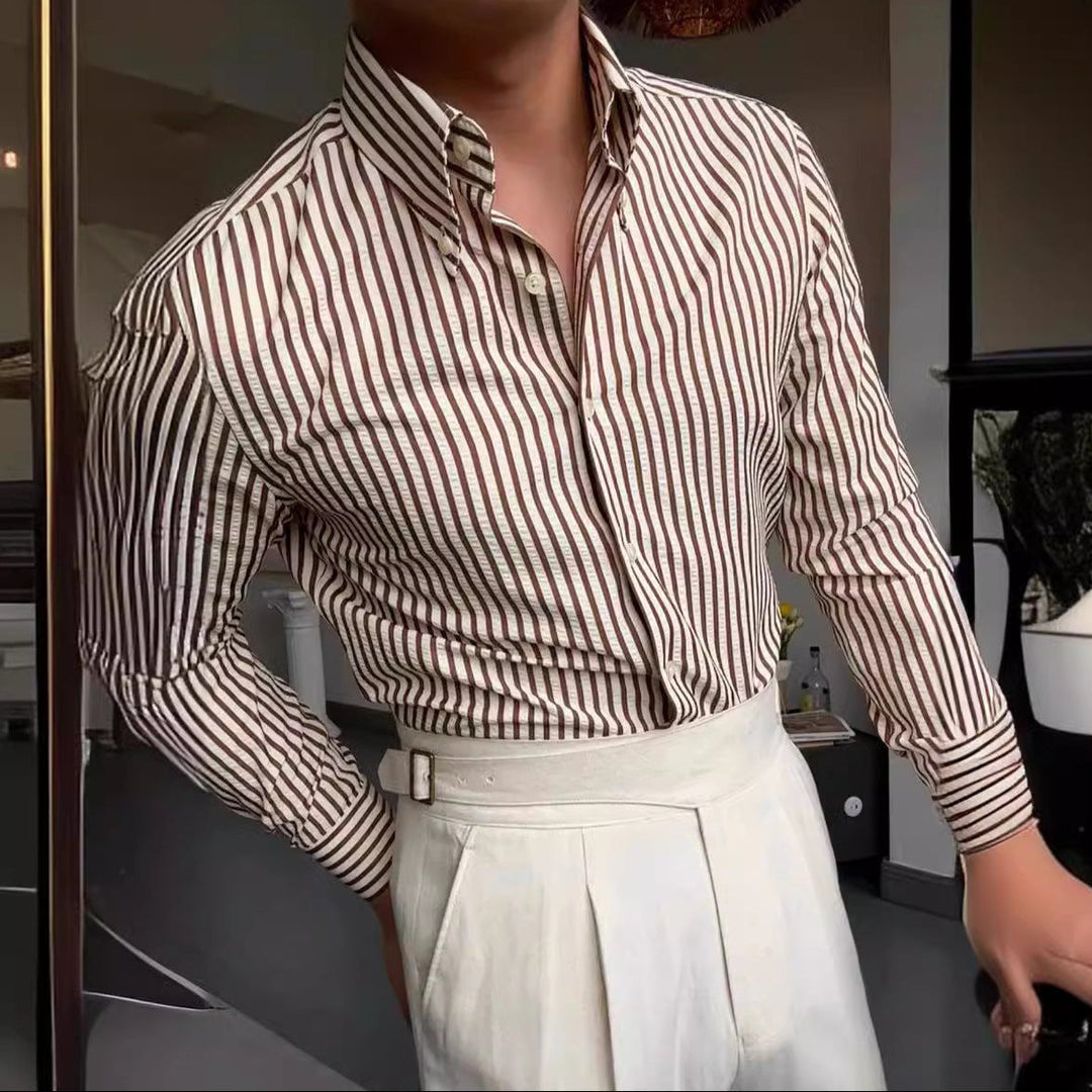 Classic men's striped button-down dress shirt with long sleeves, offering a versatile and smart casual look.