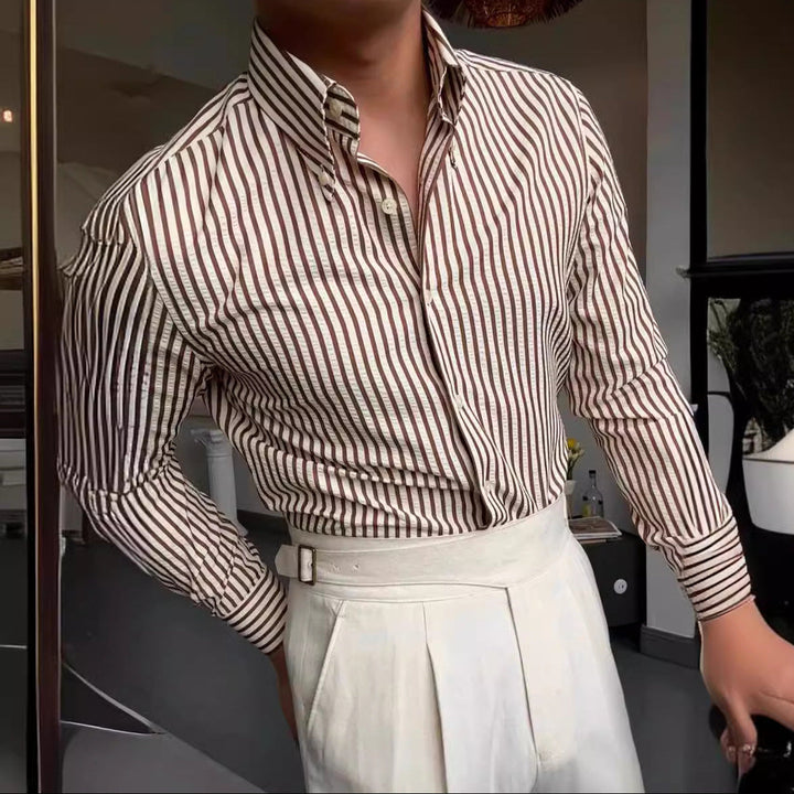 Classic men's striped button-down dress shirt with long sleeves, offering a versatile and smart casual look.