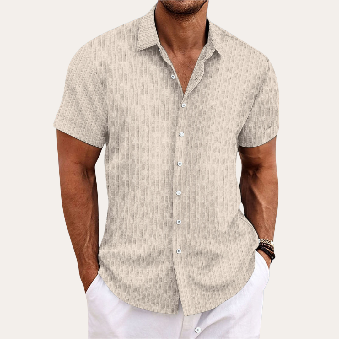 Versatile men's striped short-sleeve button-down shirt, great for office casual or summer wear.