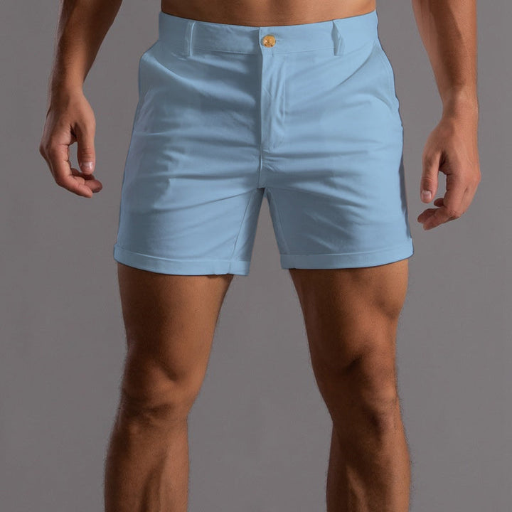 Versatile men's chino shorts with a tailored fit, ideal for stylish warm weather fashion & comfort.
