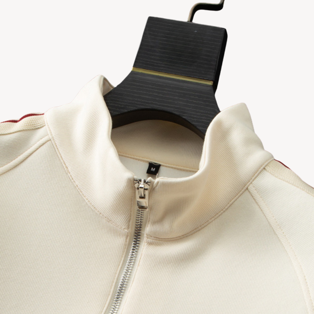 Modern men's tracksuit set: sleek zip hoodie & fitted joggers for a stylish athletic look & active comfort.