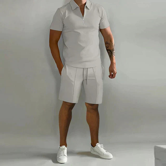 Coordinated men's polo shirt & shorts set, ideal for warm weather vacation style & relaxed casual outfits.