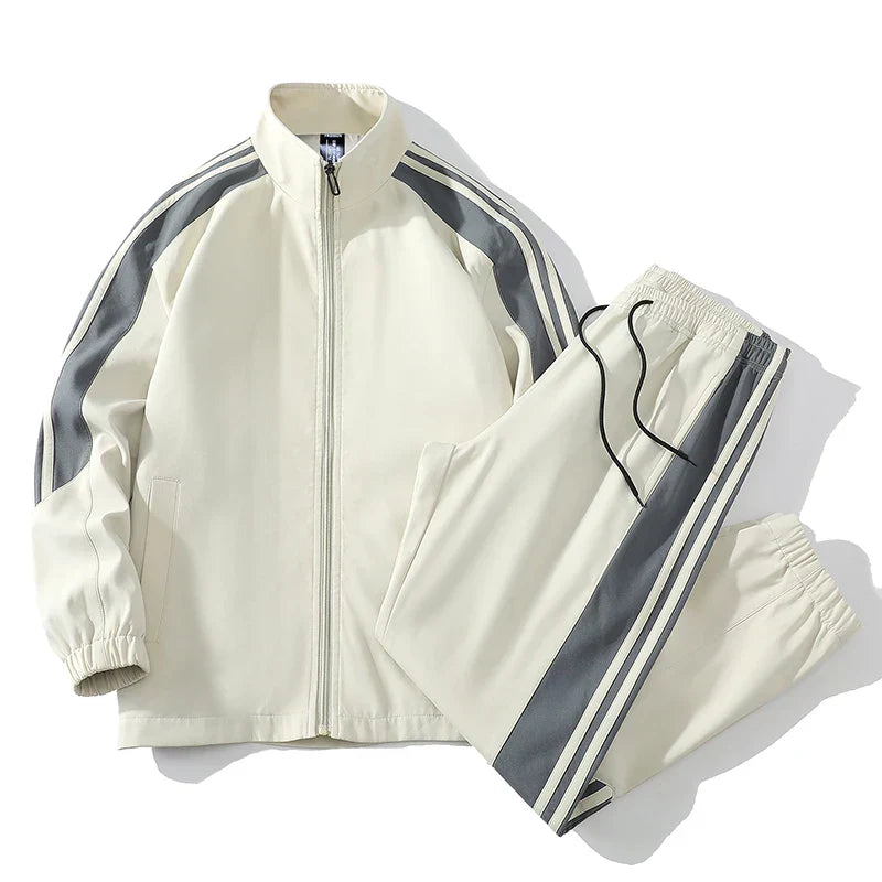 Men's stylish two-piece tracksuit with full zip jacket and tapered joggers.