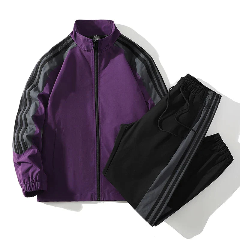 Versatile men's outfit: comfortable tracksuit with full zip jacket and tapered pants.