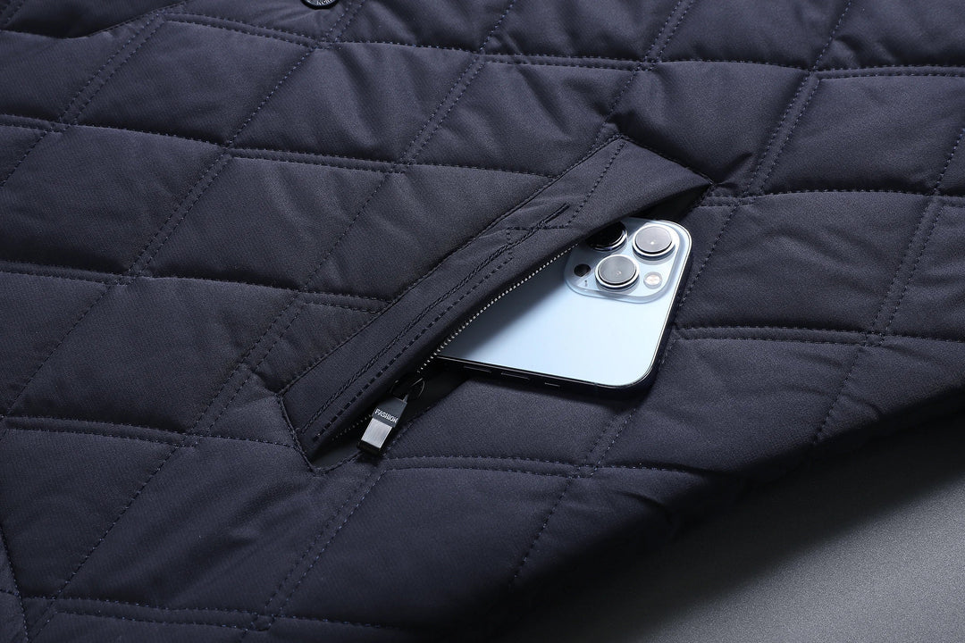 Comfortable men's waterproof transition jacket, zipped for casual fall/spring outdoor wear. Stylish & versatile.