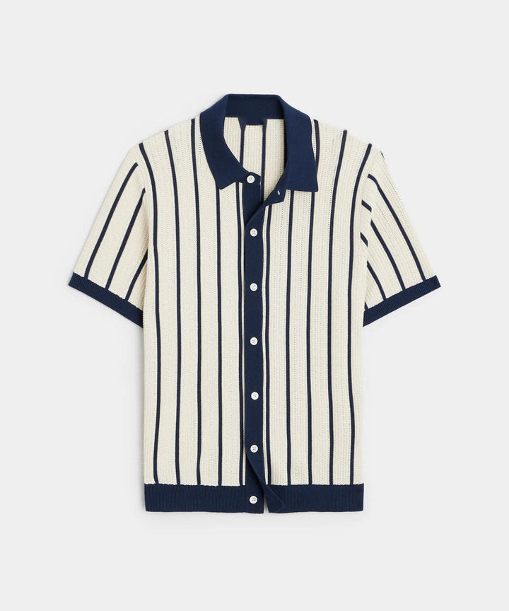 White vertical striped men's button-down shirt with short sleeves, offering a smart casual look for any summer outing.