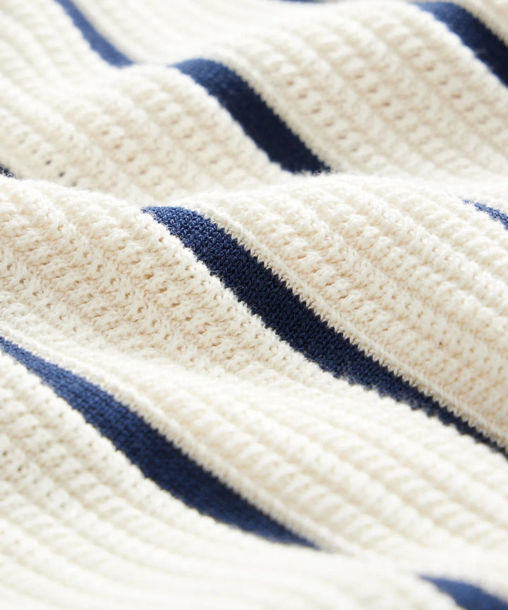 Modern men's white vertical striped short-sleeve button-down shirt, a comfortable smart casual top for warm weather.