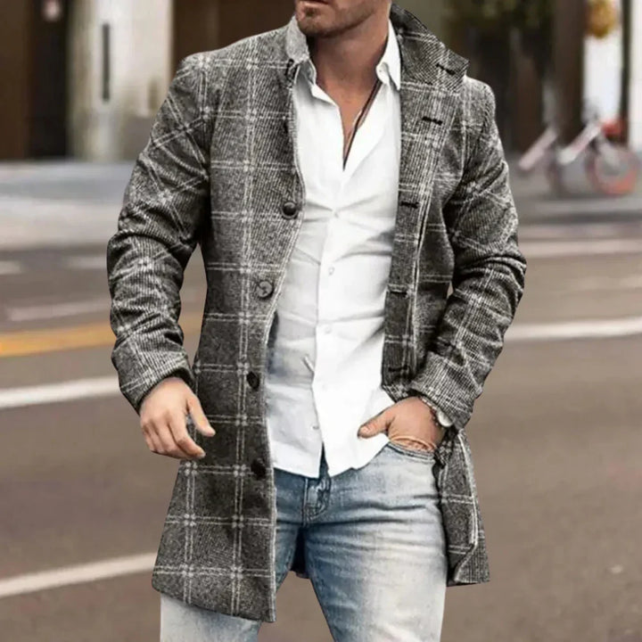 Classic men's outerwear, a warm winter coat with tailored fit & button closure for refined cold weather style.