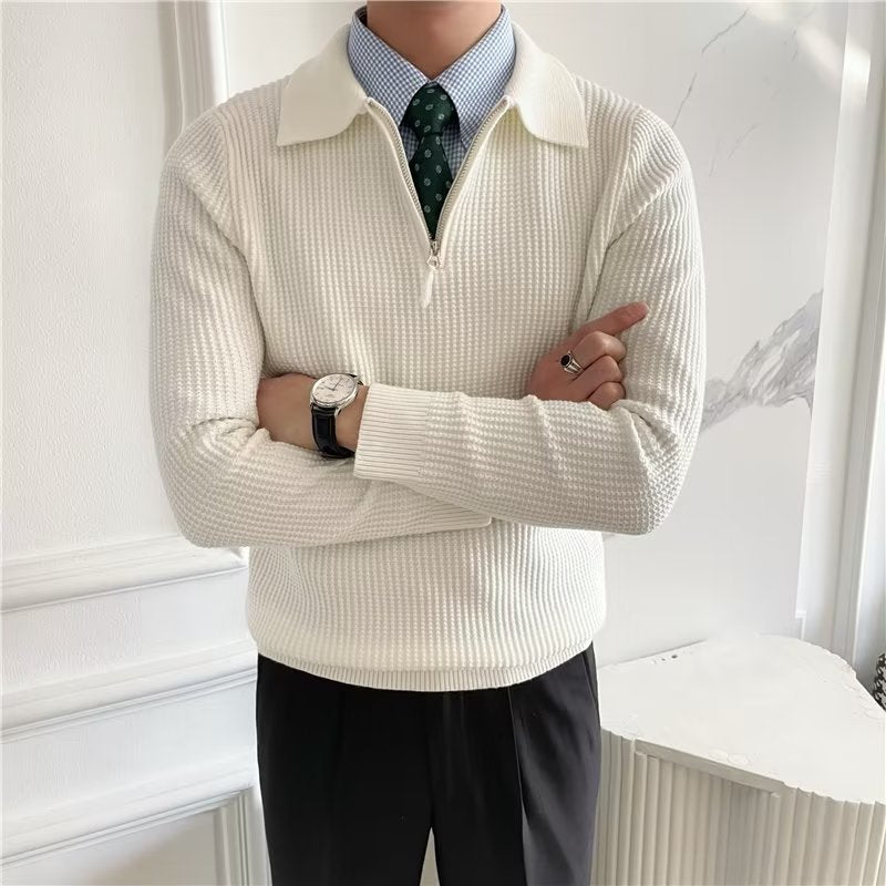 Man wearing a stylish zip-up polo sweater, showcasing classic knitwear fashion for fall.