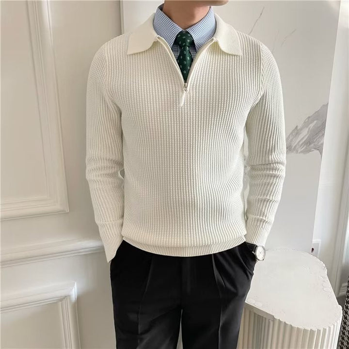 Detail of a men's knit zip-up polo sweater, highlighting the collar and texture for smart casual.