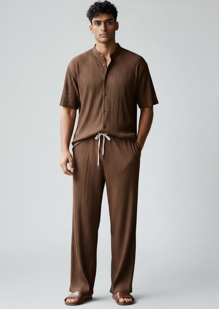 Relaxed fit men's summer casual shirt & drawstring pants set. A trendy two-piece for warm weather fashion.