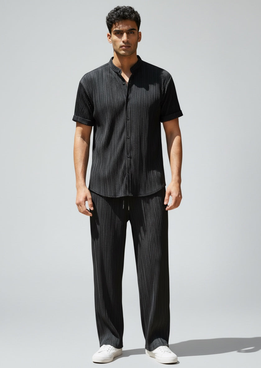 Men's holiday outfit: a stylish summer casual shirt and soft drawstring pants co-ord set. Perfect for leisure.