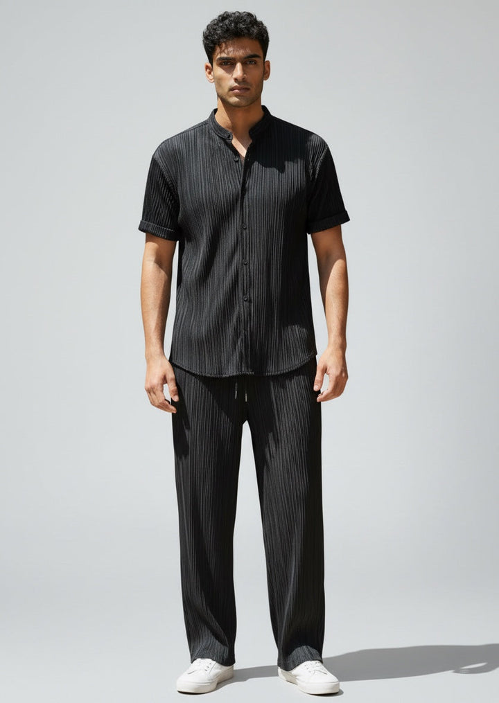 Men's holiday outfit: a stylish summer casual shirt and soft drawstring pants co-ord set. Perfect for leisure.