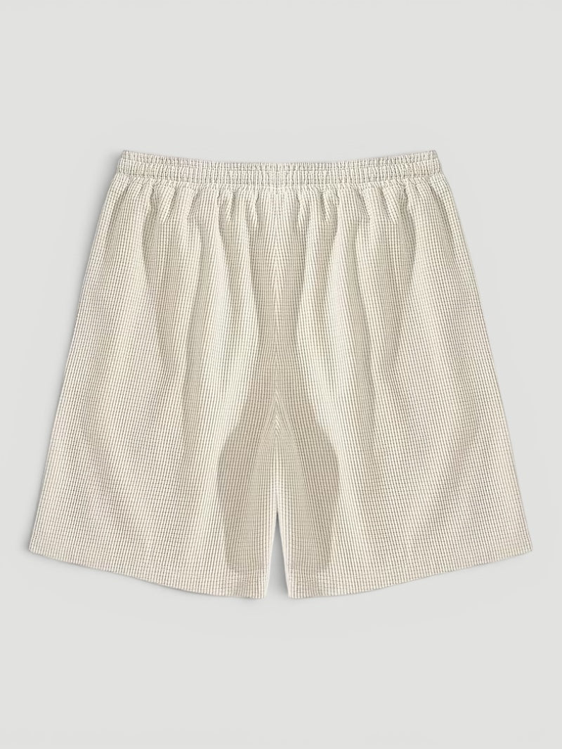 Lightweight men's breathable textured shorts with adjustable drawstring for ultimate summer comfort.