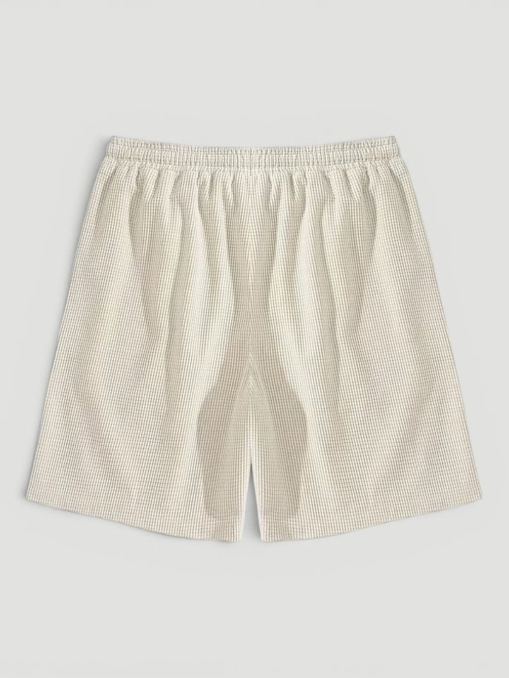 Lightweight men's breathable textured shorts with adjustable drawstring for ultimate summer comfort.