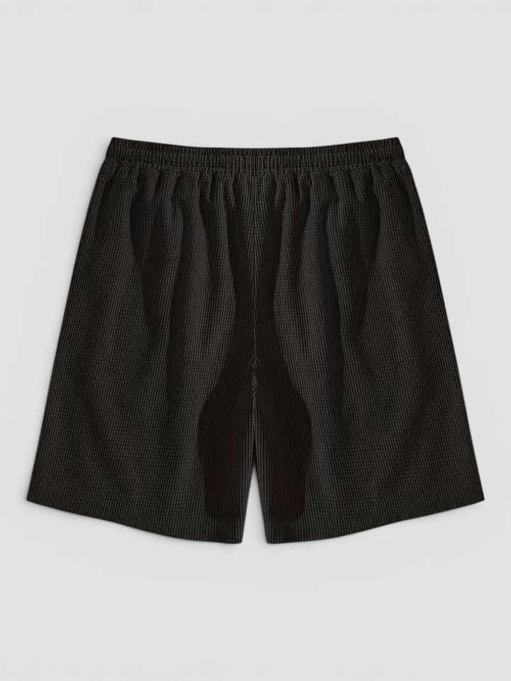 Casual men's textured shorts for summer. Drawstring waist & breathable fabric perfect for beach/vacation.