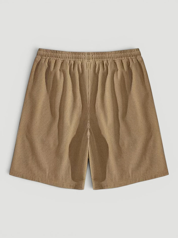 Comfortable & breathable men's summer shorts with a stylish textured finish & adjustable drawstring.
