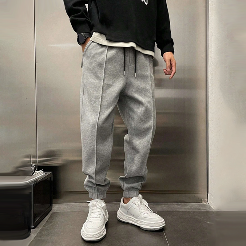 Stylish men's relaxed fit trousers, ideal for smart casual everyday wear and comfort.