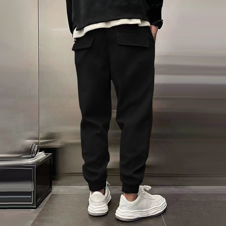 Men's everyday wear pants, supreme comfort and relaxed fit for various activities.