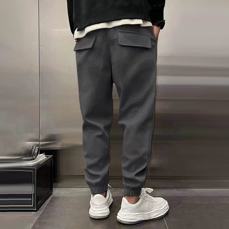 Modern men's relaxed fit trousers, offering supreme comfort for stylish everyday wear.
