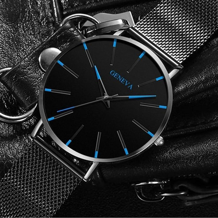 Angled shot: Timeless men's minimalist watch. Eco-friendly, black band, analog display, sustainable design.