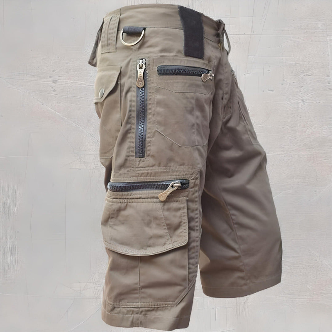 Rugged men's cargo shorts with multiple utility pockets for hiking and travel.