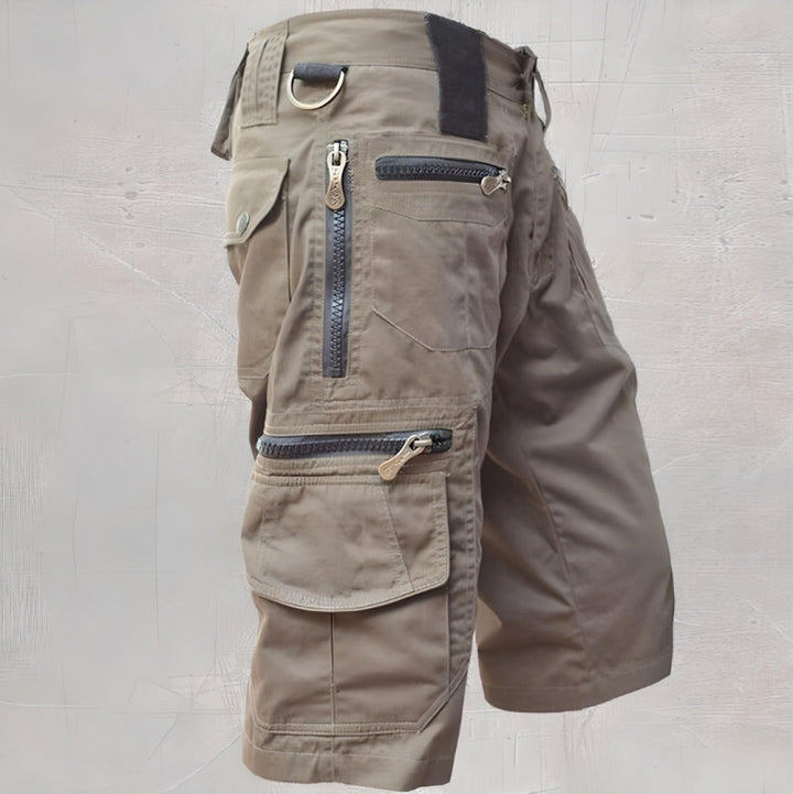 Rugged men's cargo shorts with multiple utility pockets for hiking and travel.