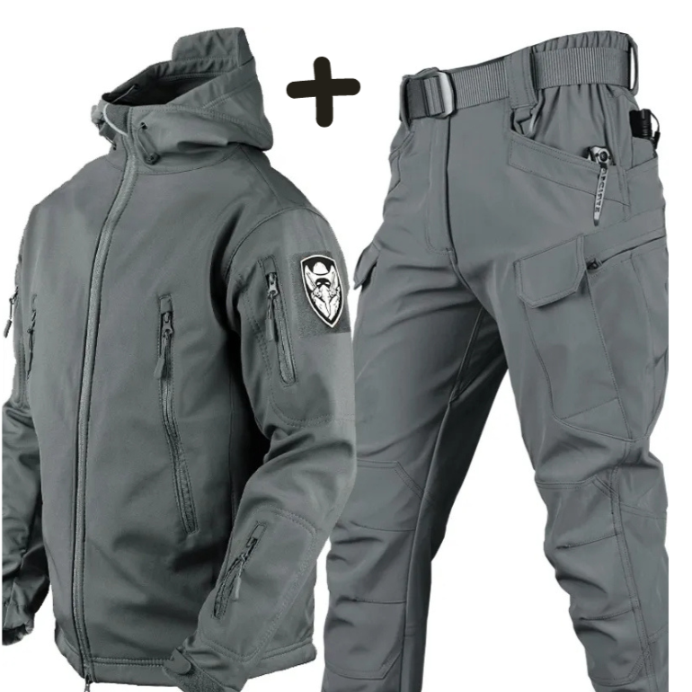 Man wearing full tactical hooded jacket & cargo pants set. Perfect matching set for rugged outdoor utility.