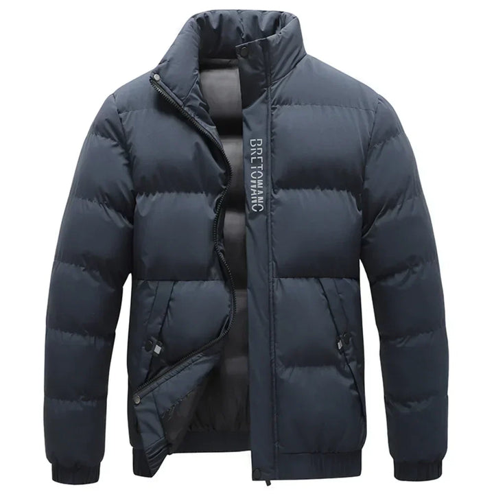 Men's tactical winter jacket, warm, windproof & stylish for cold weather. Durable outdoor outerwear.